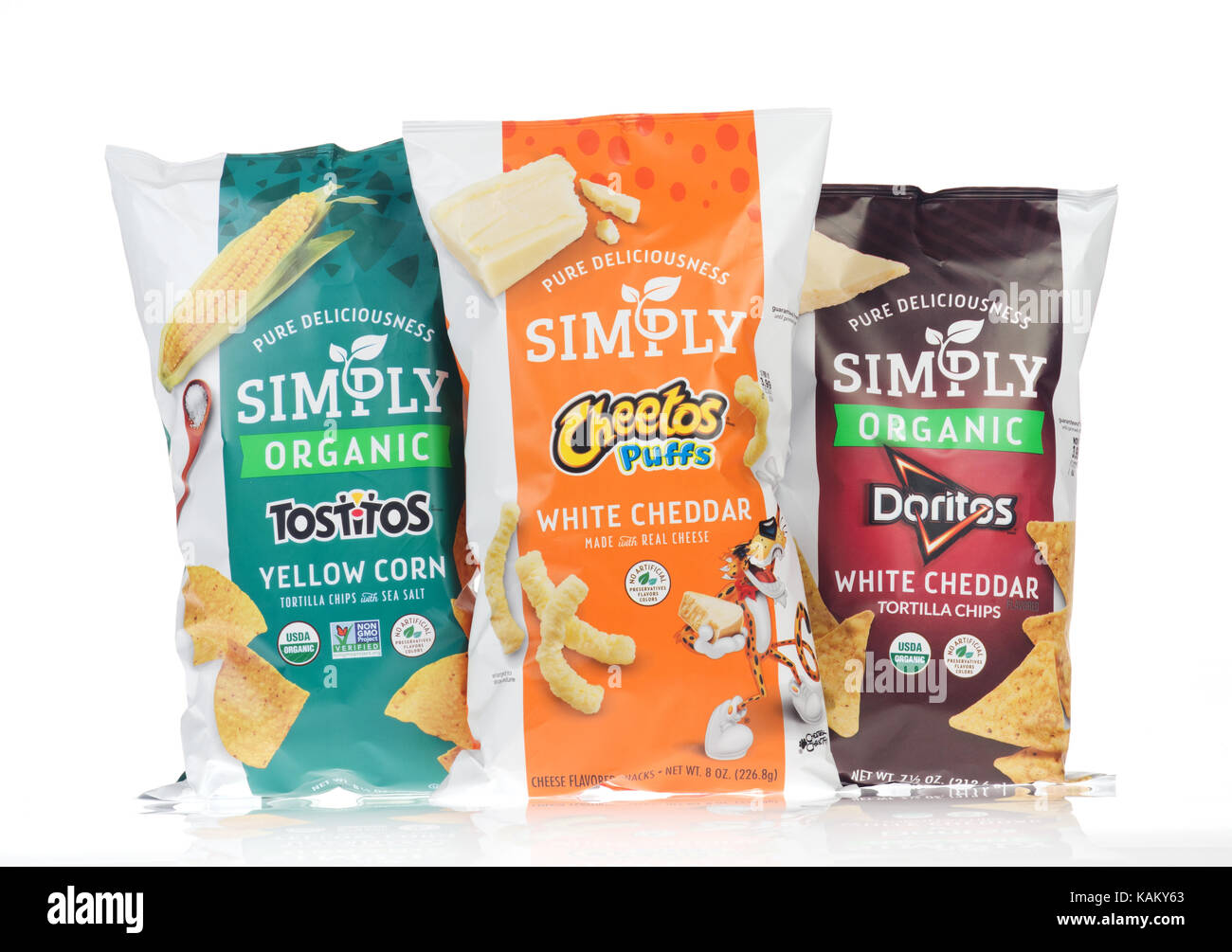 Bags of Simply Organic Tostitos, Simply Cheetos and Simply Organic Doritos by Frito-Lay on white background, cut out USA Stock Photo