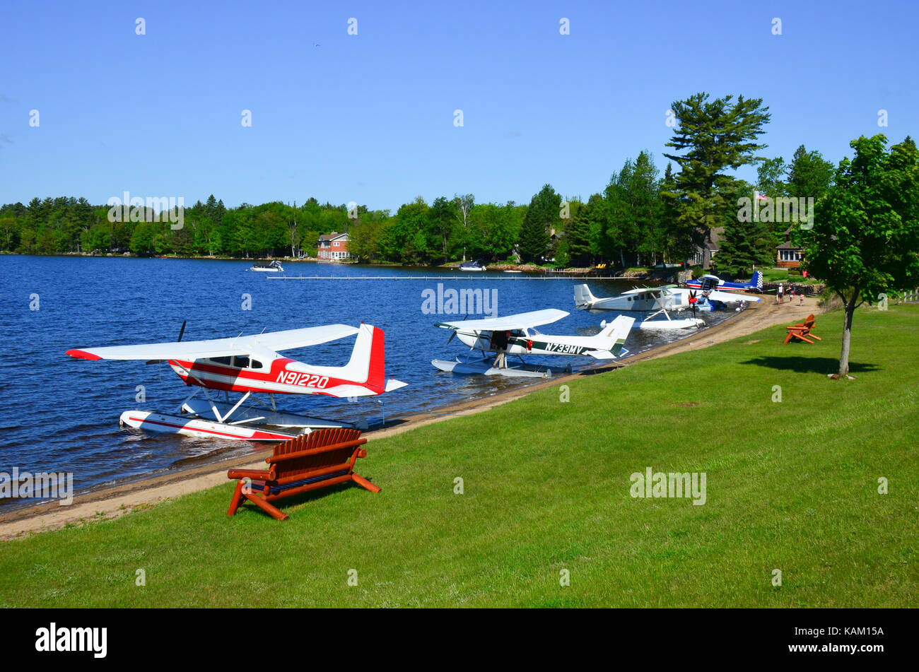 Gathering of float planes at the public park beach on Lake Pleasant at