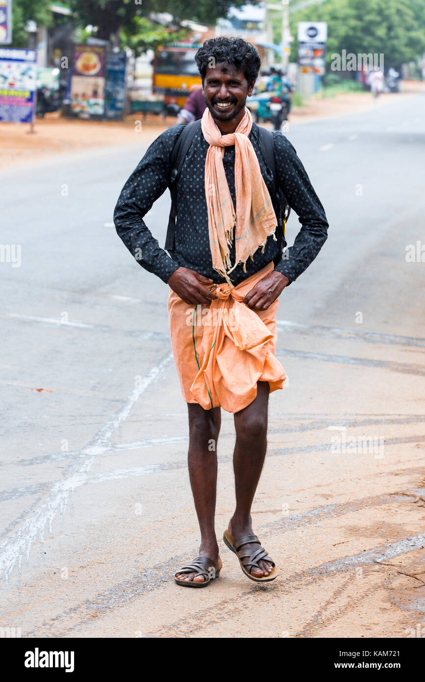 PONDICHERY, PUDUCHERY, INDIA - AUGUST 28, 2017. Unidentified christians, catholics, hinduists people, with orange dress, pilgrims walk from chennai to Stock Photo