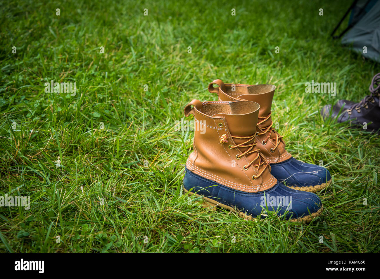 hiking boots at campsite Stock Photo Alamy