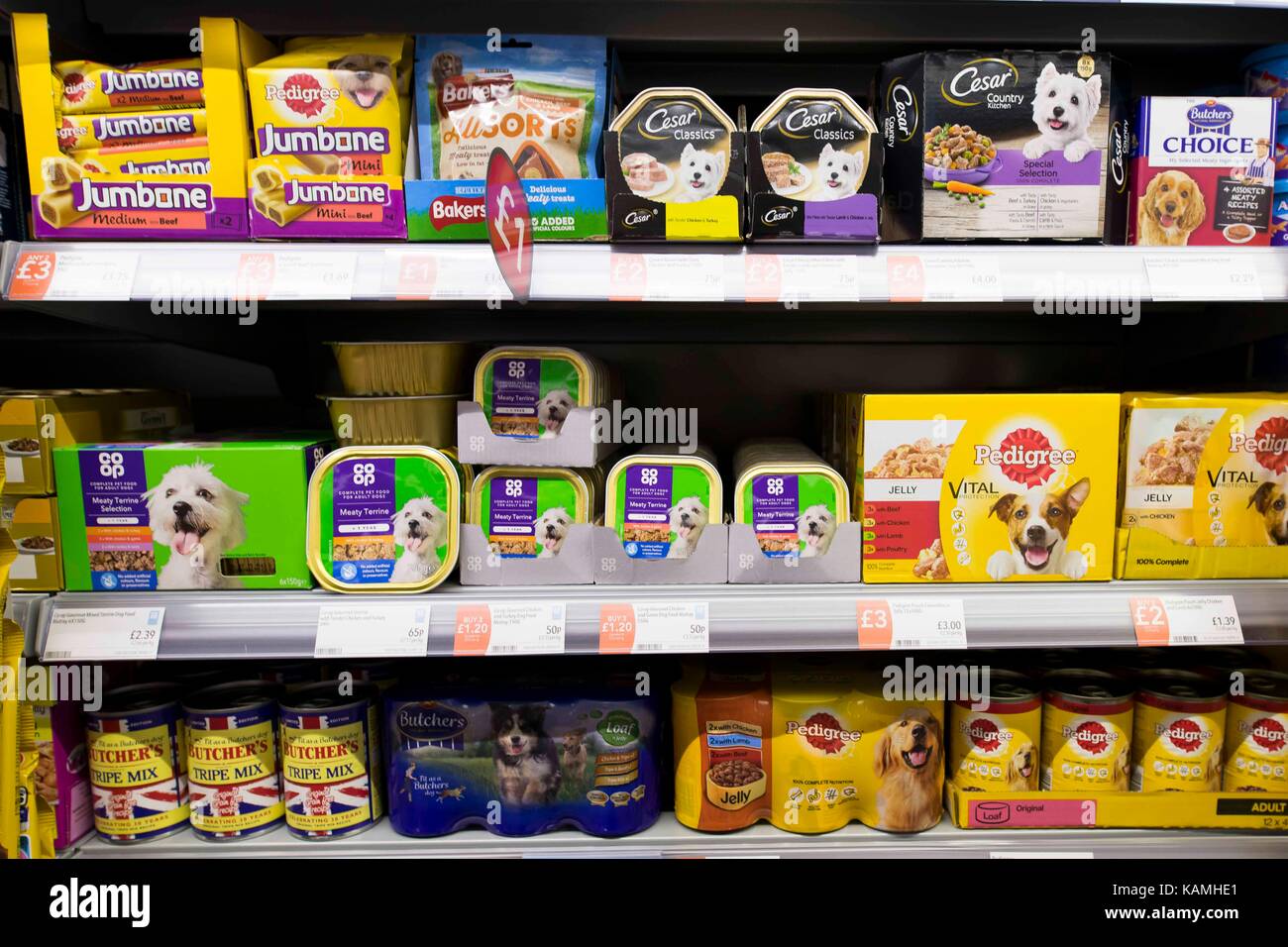 Cat and dog pet food on display on a supermarket shelf Stock Photo