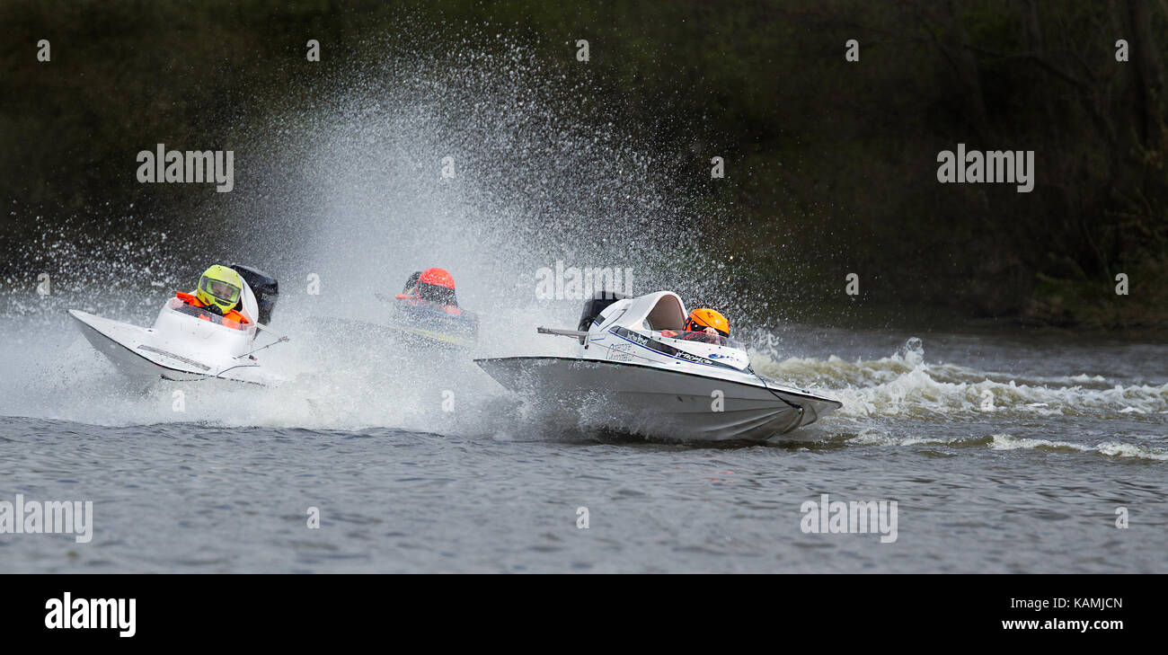 Powerboat racers racing at Carr Mill Dam in St Helens, England, UK Stock Photo