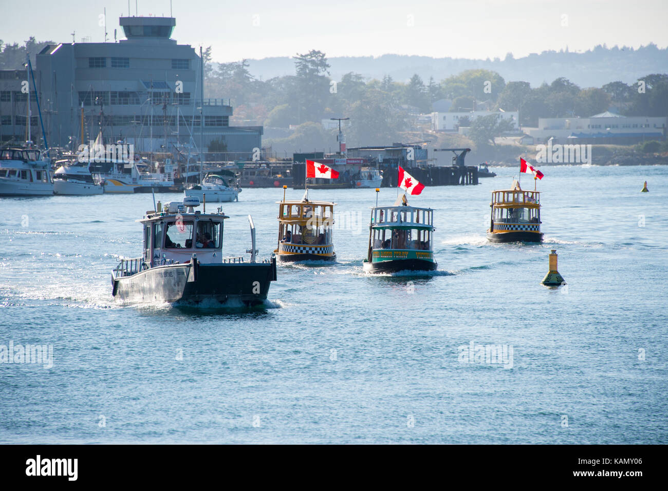 Victoria, BC, Canada - 11 September 2017: Three water Taxi in Victoria Harbour Stock Photo