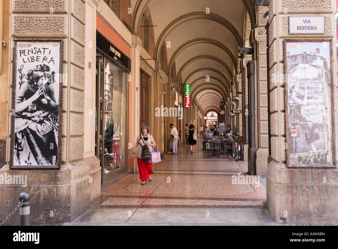 people-walking-in-bologna-porticoes-covered-footpath-in-via