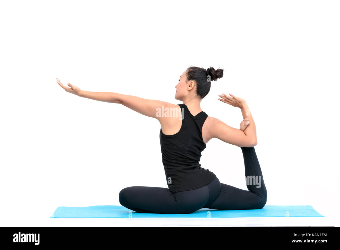 Beautiful Asian woman practicing yoga pose on white background Stock ...