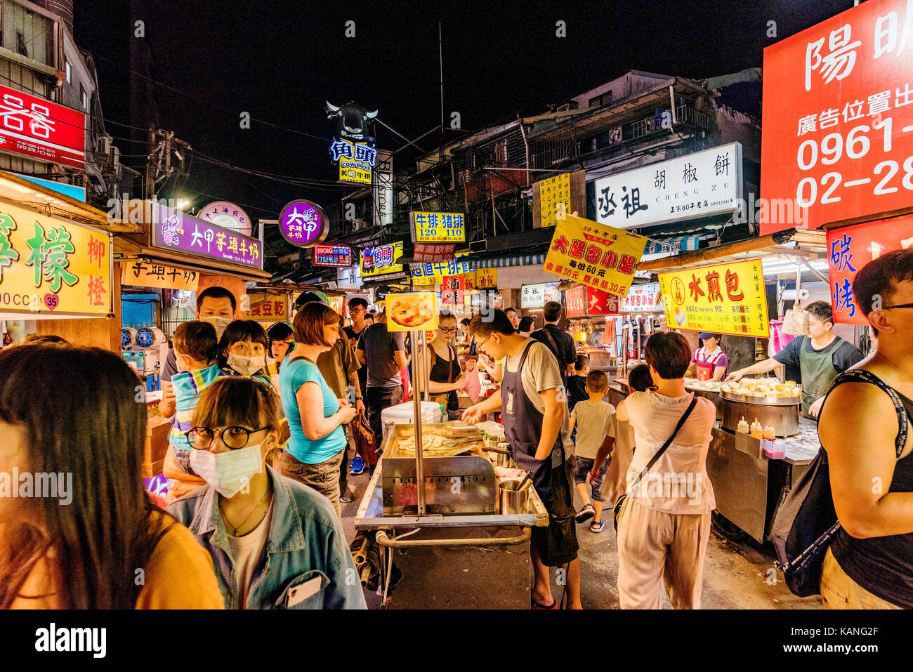 TAIPEI, TAIWAN - JULY 11: This is Shilin night market a famous night market where many people come to try Taiwanese food and go shopping on July 11, 2 Stock Photo