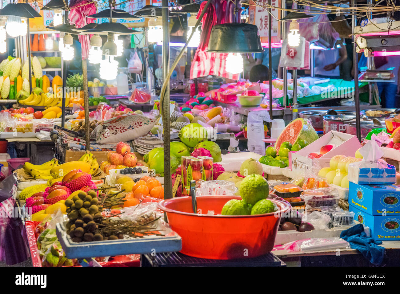 TAIPEI, TAIWAN - JULY 14: This is a typical night market fruit stall which are common across night markets in Taiwan on July 14, 2017 in Taipei Stock Photo