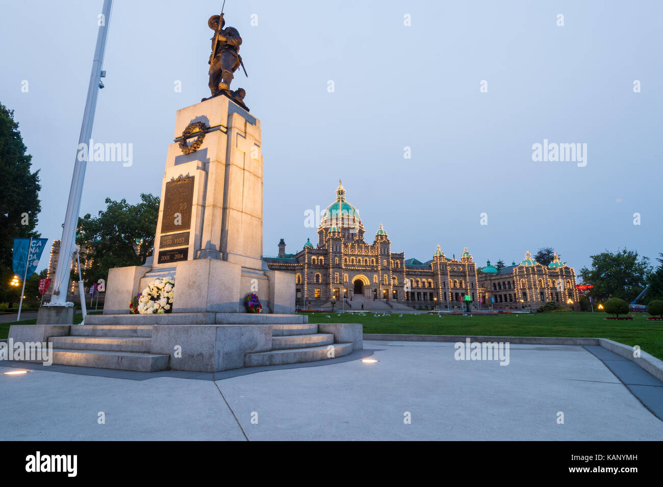 Victoria, British Columbia, Canada - 7 September 2017: British Columbia Parliament Buildings and War memorial To Our Glorious Dead Stock Photo