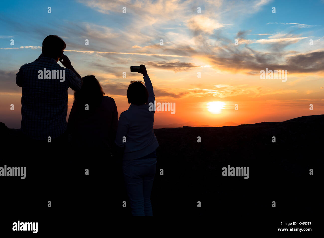 Selfie Silhouette at sunset. Stock Photo