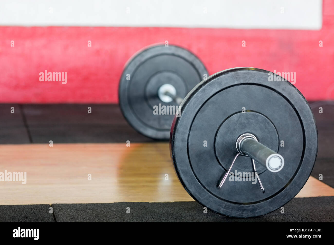 Barbell On Floor In Fitness Center Stock Photo Alamy