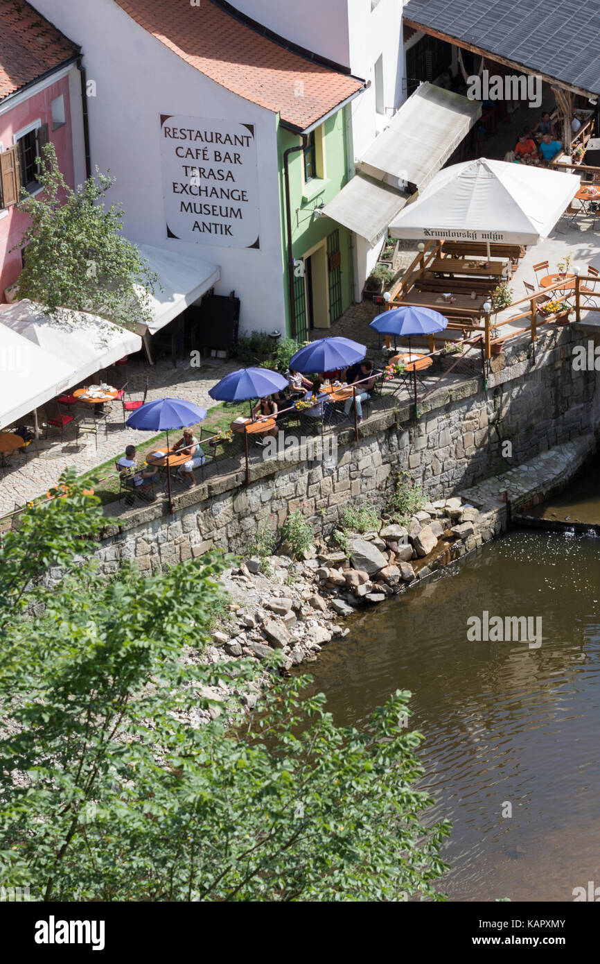 glimpse from the other of a touristic spot on the banks of the river in the historic center of the city Stock Photo