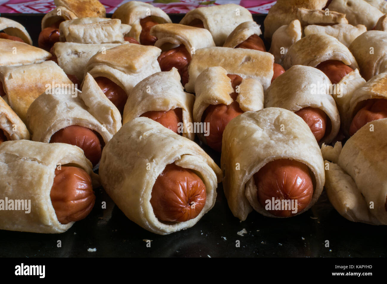 Homemade mini hot dogs sausage dough on the tray Stock Photo Alamy