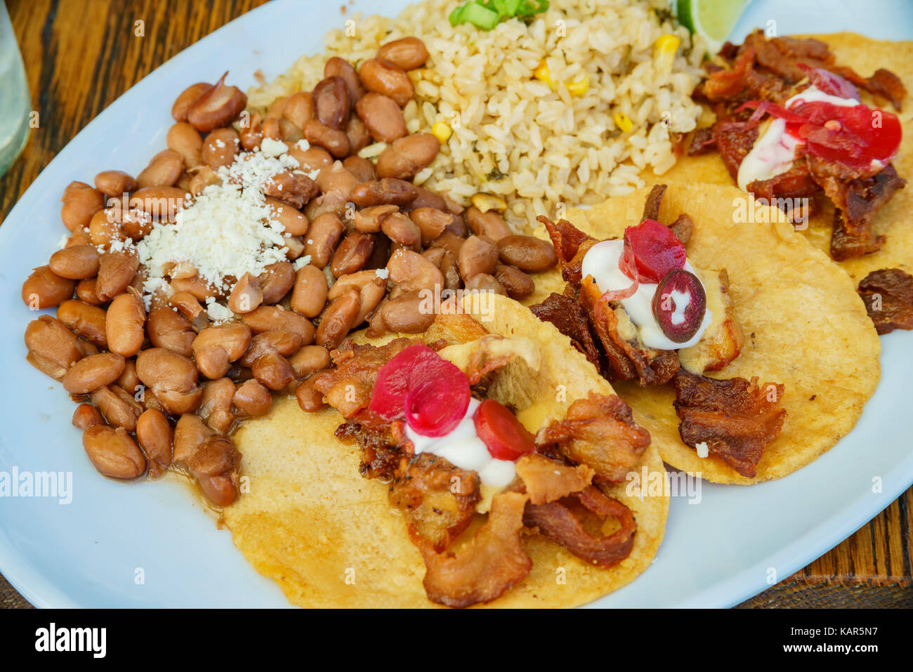 Close up shot of Mexican style Taco, serve with beans and rice, ate at Santa Monica, Los Angeles County, California, United States Stock Photo