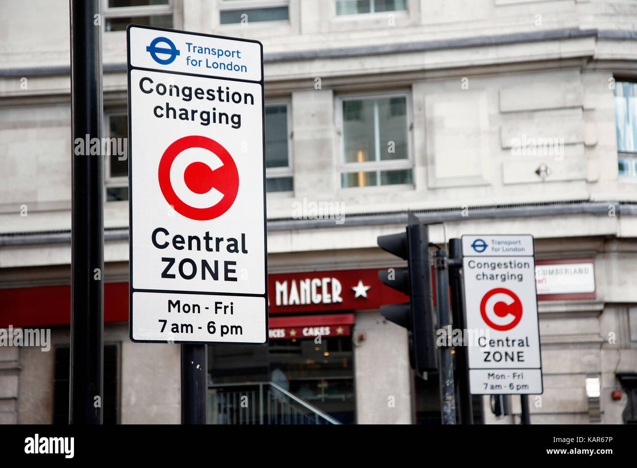 Congestion Charge Zone Sign, introduced 2003 to reduce congestion in central London. The standard charge is 11.50 for each day Monday-Friday only. Stock Photo
