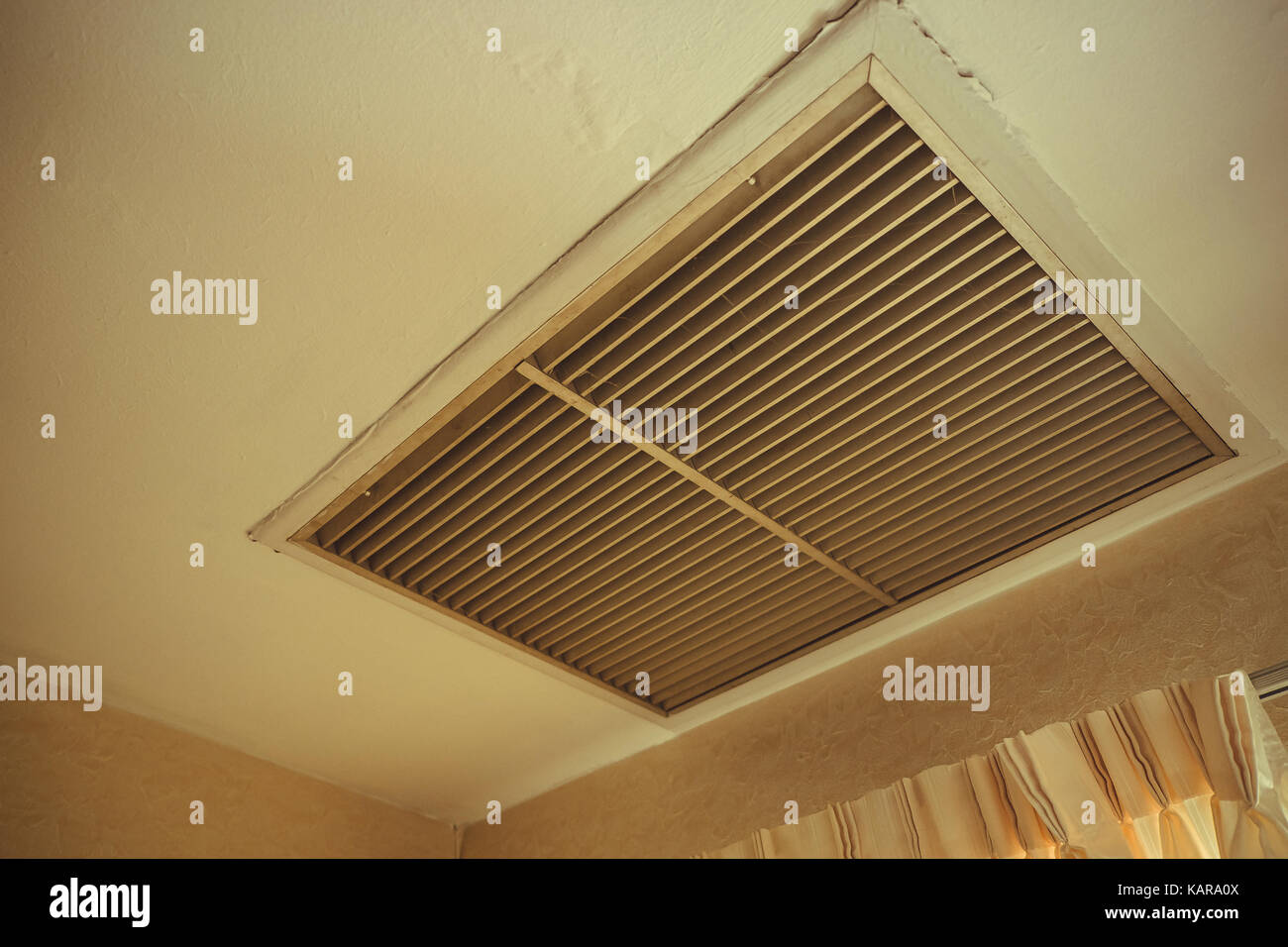 Large Square Return Air Vent Located In The Ceiling Of A Home Air