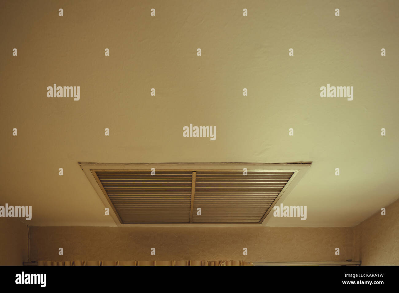 Large Square Return Air Vent Located In The Ceiling Of A Home Air