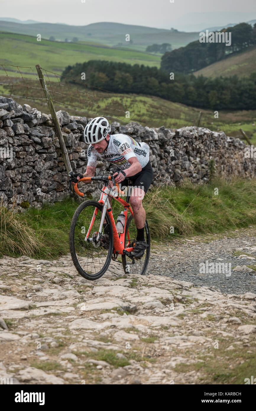 Ian Taylor, veteran world champion, in the 3 Peaks cyclocross, Yorkshire, UK. Stock Photo