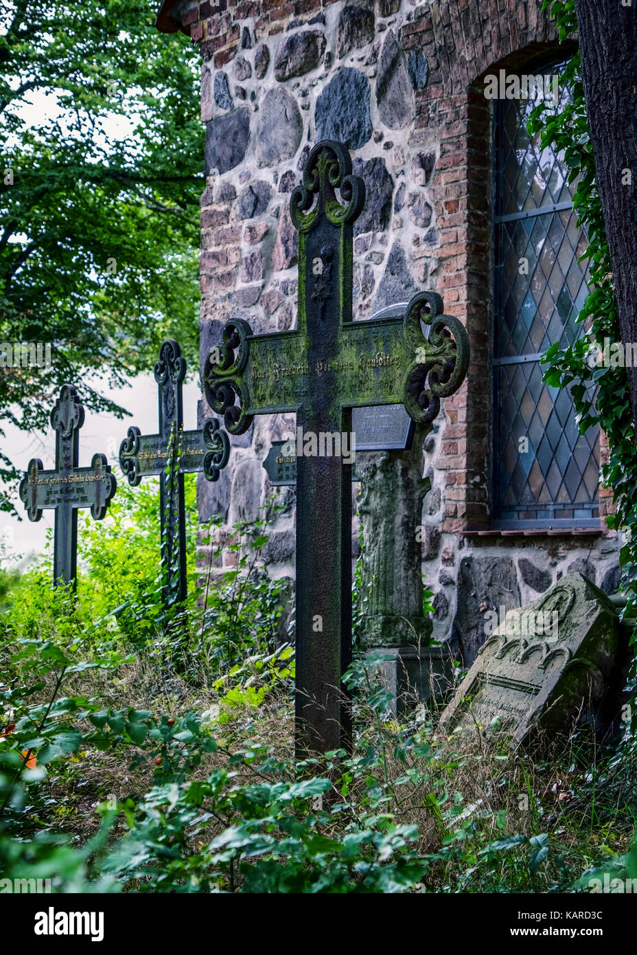 Berlin, Alt Wittenau, Dorfkirche,Village church built  in the former Dalldorf.Mixed masonry church building is a listed monument.Old crosses Stock Photo