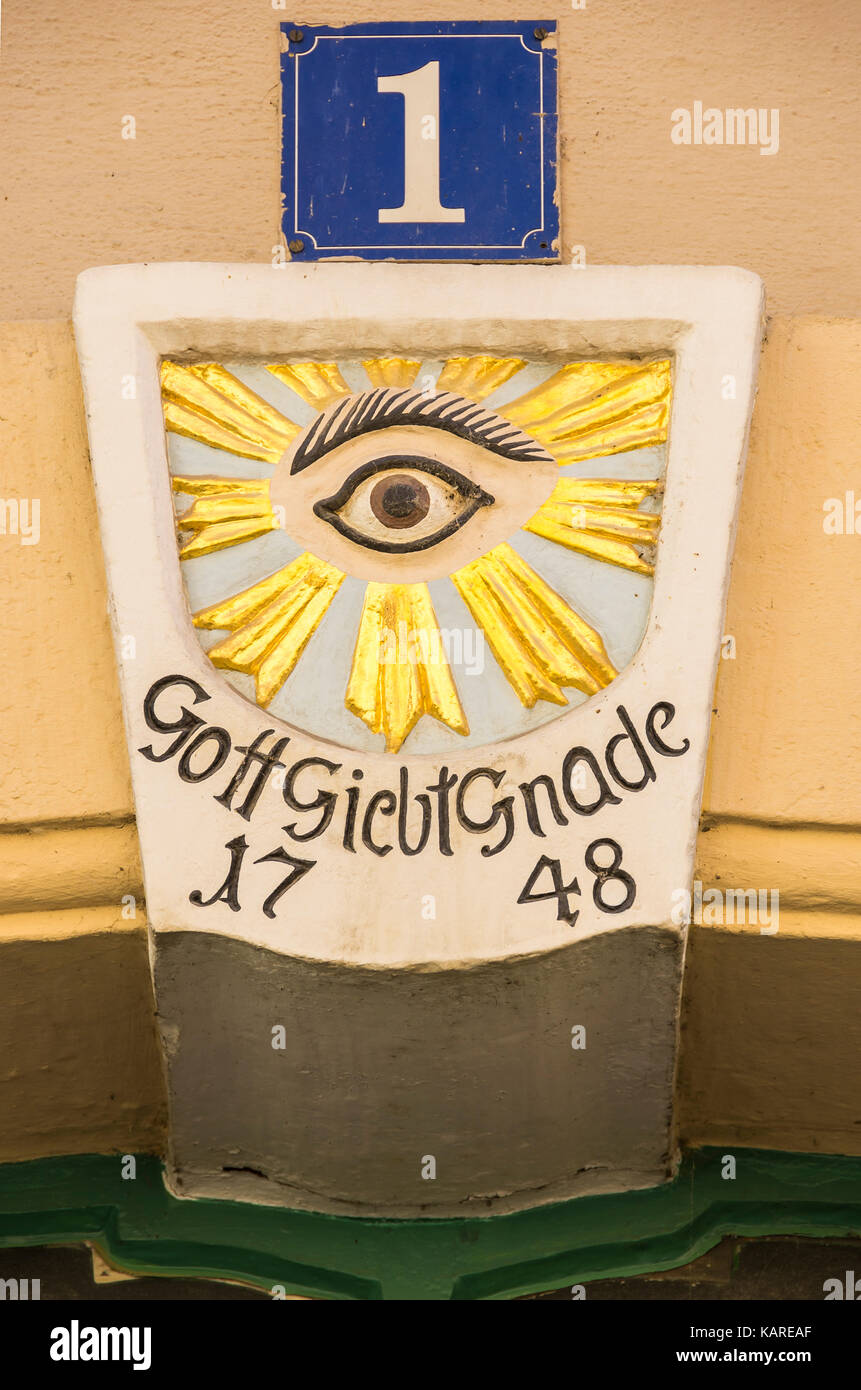 Variant of the Eye of Providence on a keystone in the doorway arch of Barbiergasse 1 in Pirna, Saxony, Germany. Stock Photo
