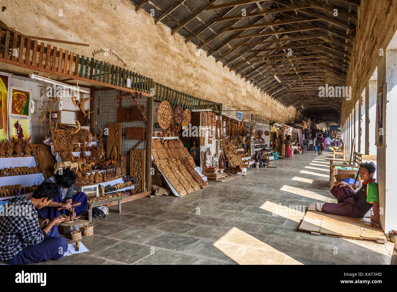 BAGAN, MYANMAR - JANUARY 23, 2016 : Sellers produce and offer souvenirs at the entry of  Shwezigon Pagoda in Nyaung Oo, Bagan, Myanmar Stock Photo