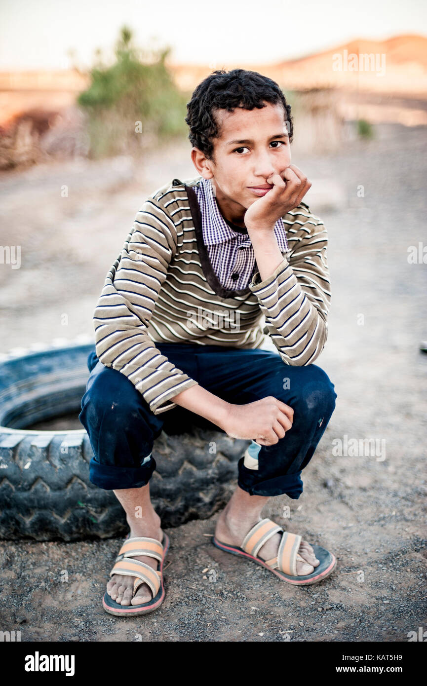 Portrait of a boy near Merzouga, Morocco Stock Photo - Alamy