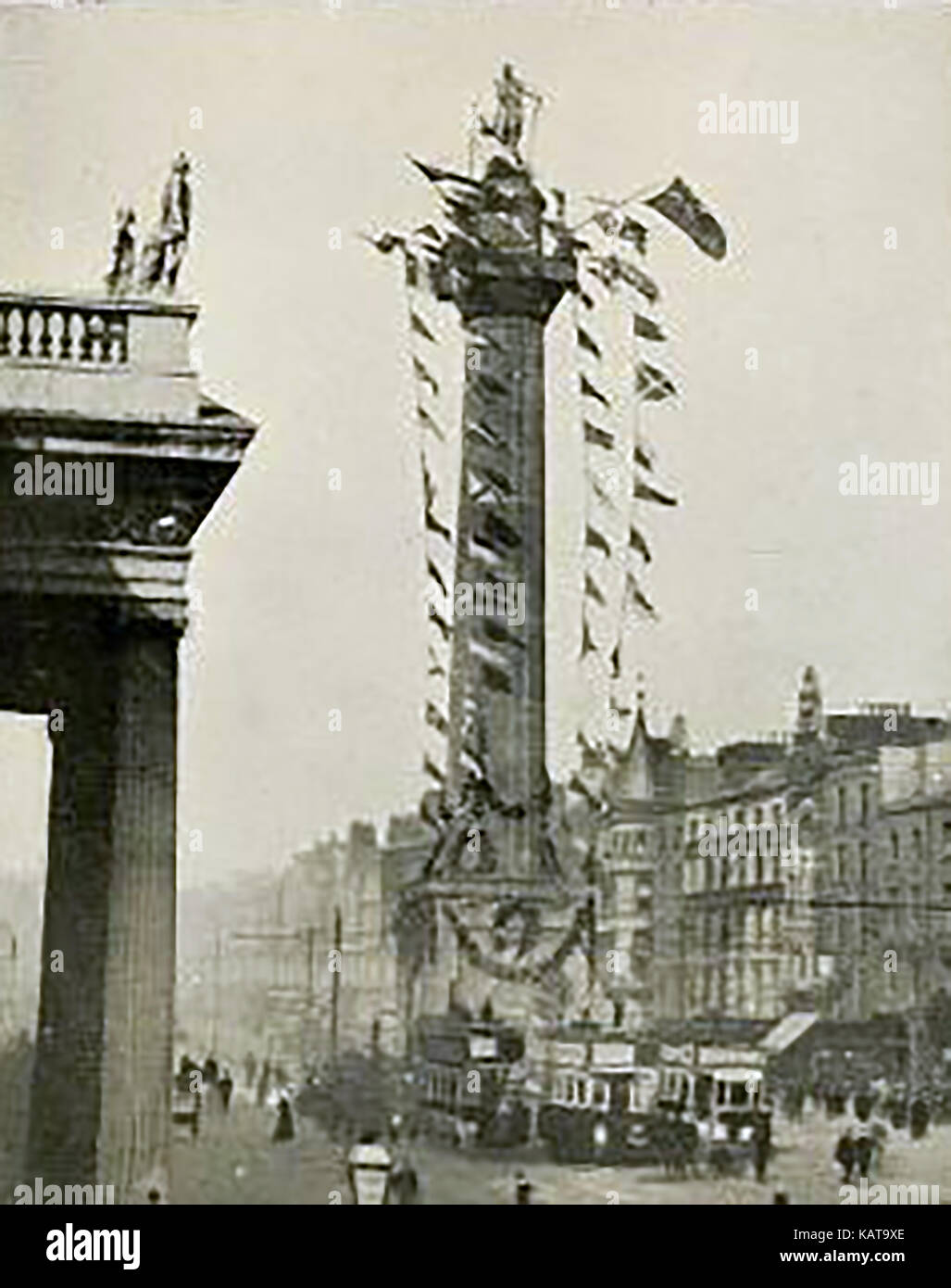 Old Dublin with its trams -The former Nelson's pillar in Sackville Street (now O'Connell Street)  decorated for Trafalgar Day Stock Photo