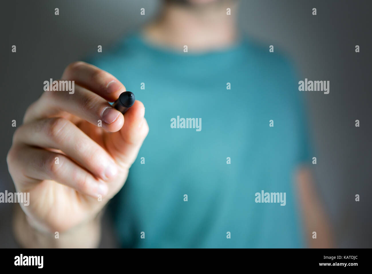 View of a Hand of man writing on empty glass with a pen Stock Photo - Alamy