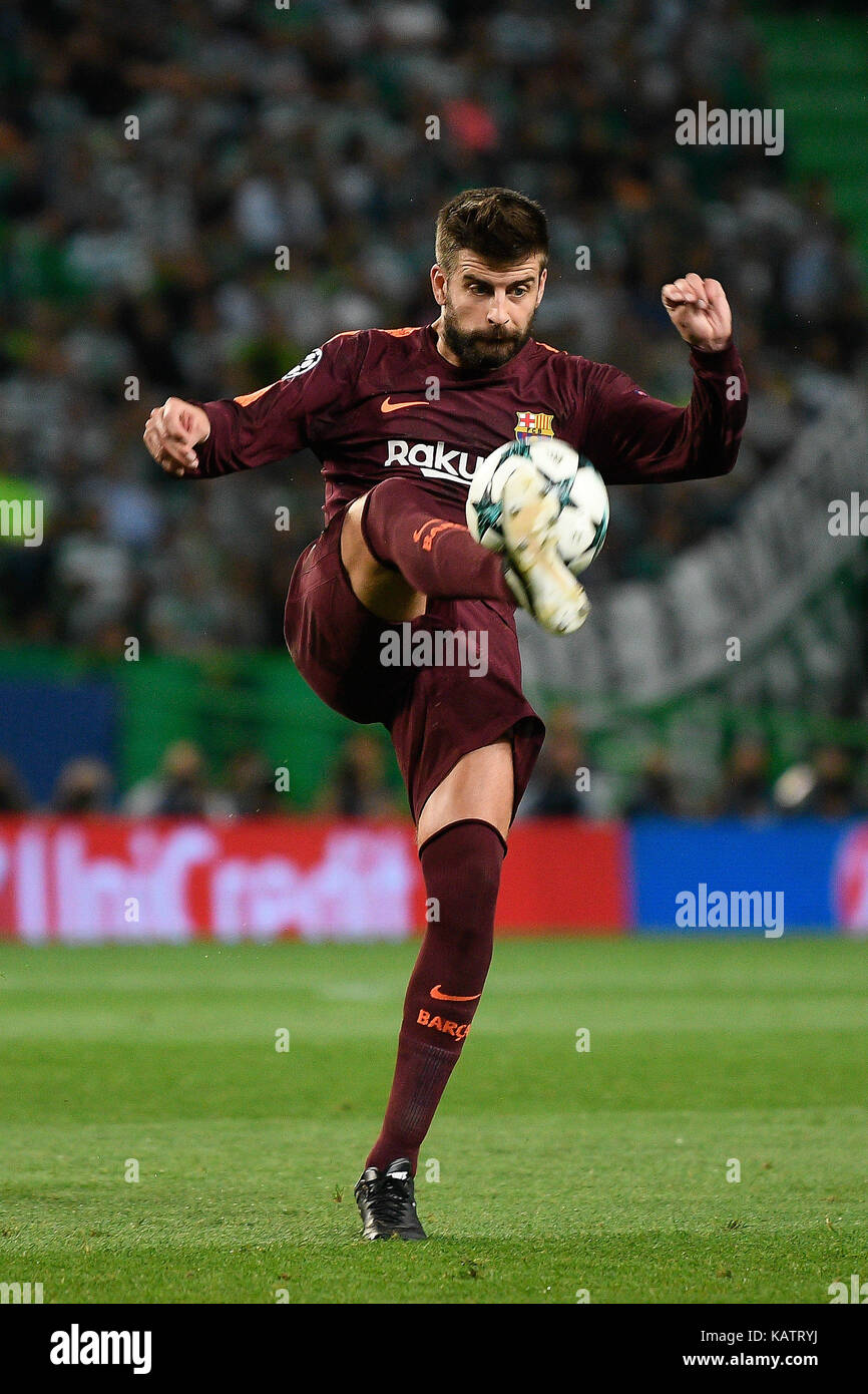 Lisbon, Portugal. 27th Sep, 2017. Gerard Pique from FC Barcelona in action during UEFA CHAMPIONS LEAGUE football match from group D between Sporting CP and FC Barcelona in Alvalade Stadium on September 27, 2017 in Lisbon, Portugal. Credit: Bruno de Carvalho/Alamy Live News Stock Photo