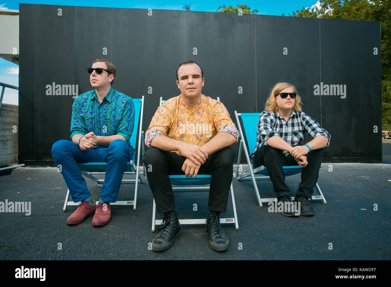 The American synthpop band Future Islands portrayed backstage before a live concert at the Norwegian music festival Øyafestivalen 2015 in Oslo. (L-R) Gerrit Welmers, Samuel T. Herring and William Cashion. Stock Photo