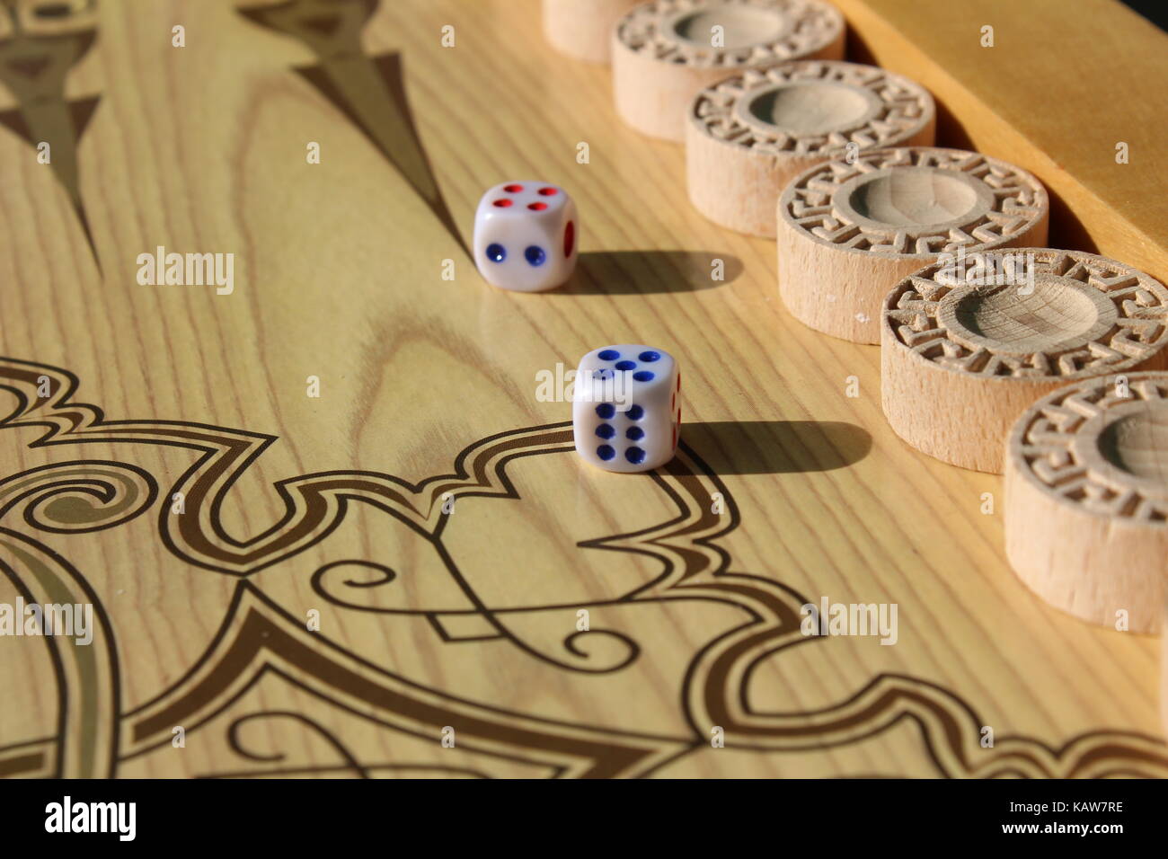Backgammon is another ancient game, which is great develops logical thinking skills. Stock Photo