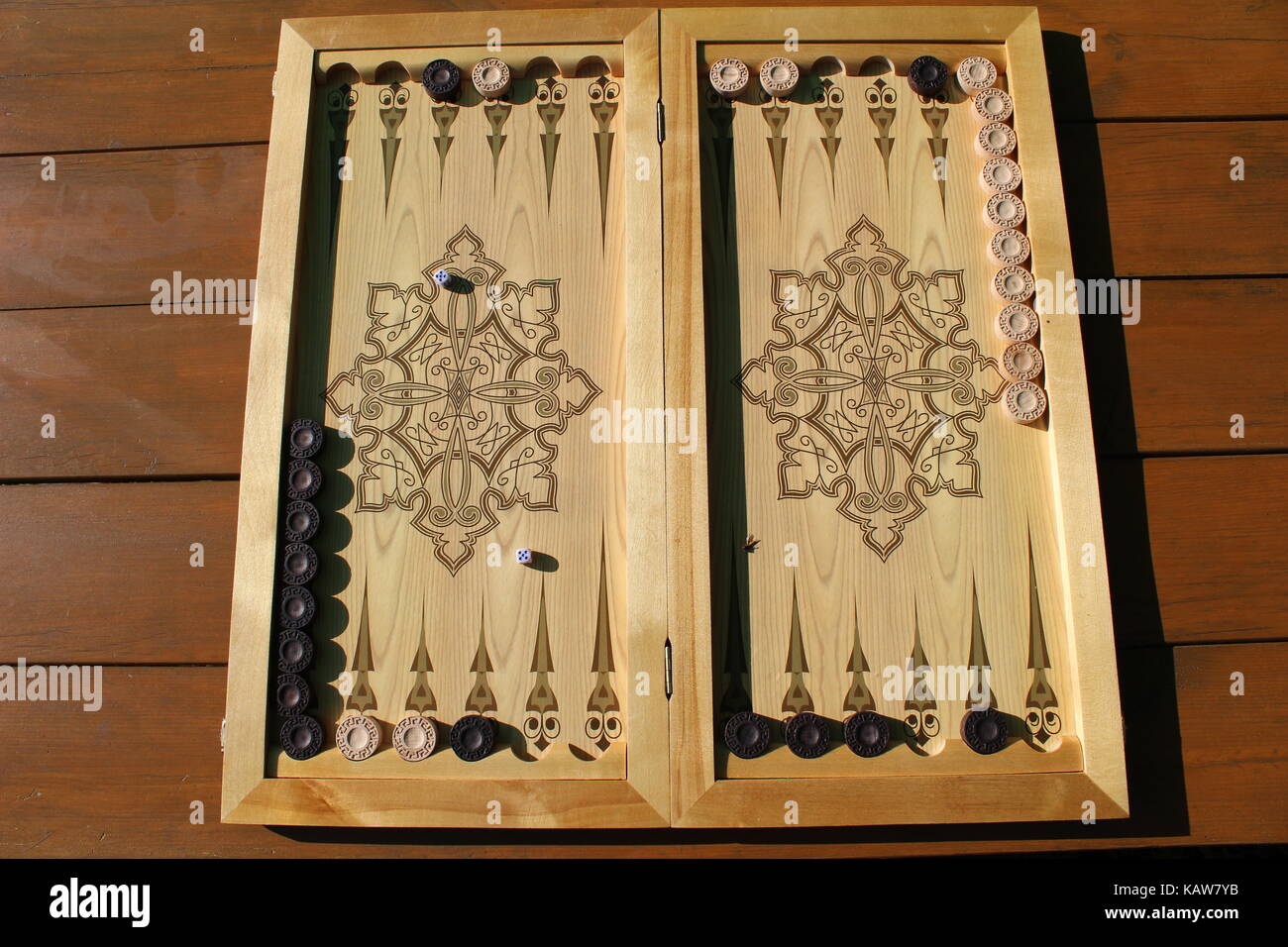 Backgammon is another ancient game, which is great develops logical thinking skills. Stock Photo