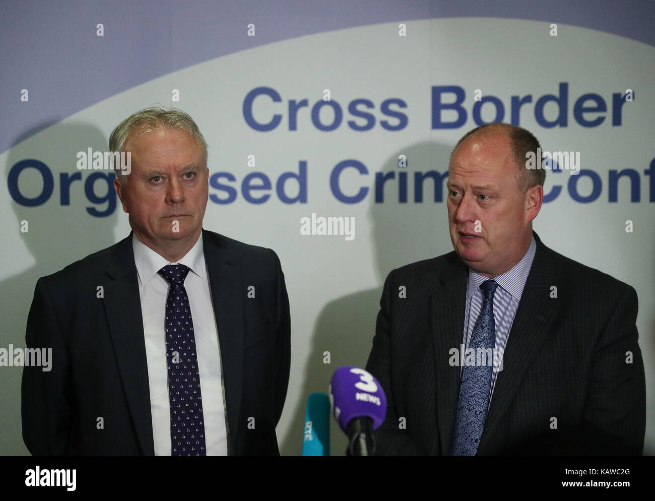 Acting Garda Commissioner Donal O Culain (left) and PSNI Chief Constable George Hamilton speaking to the media during the Cross-border conference on organised crime at the Crowne Plaza Hotel, Dundalk. Stock Photo