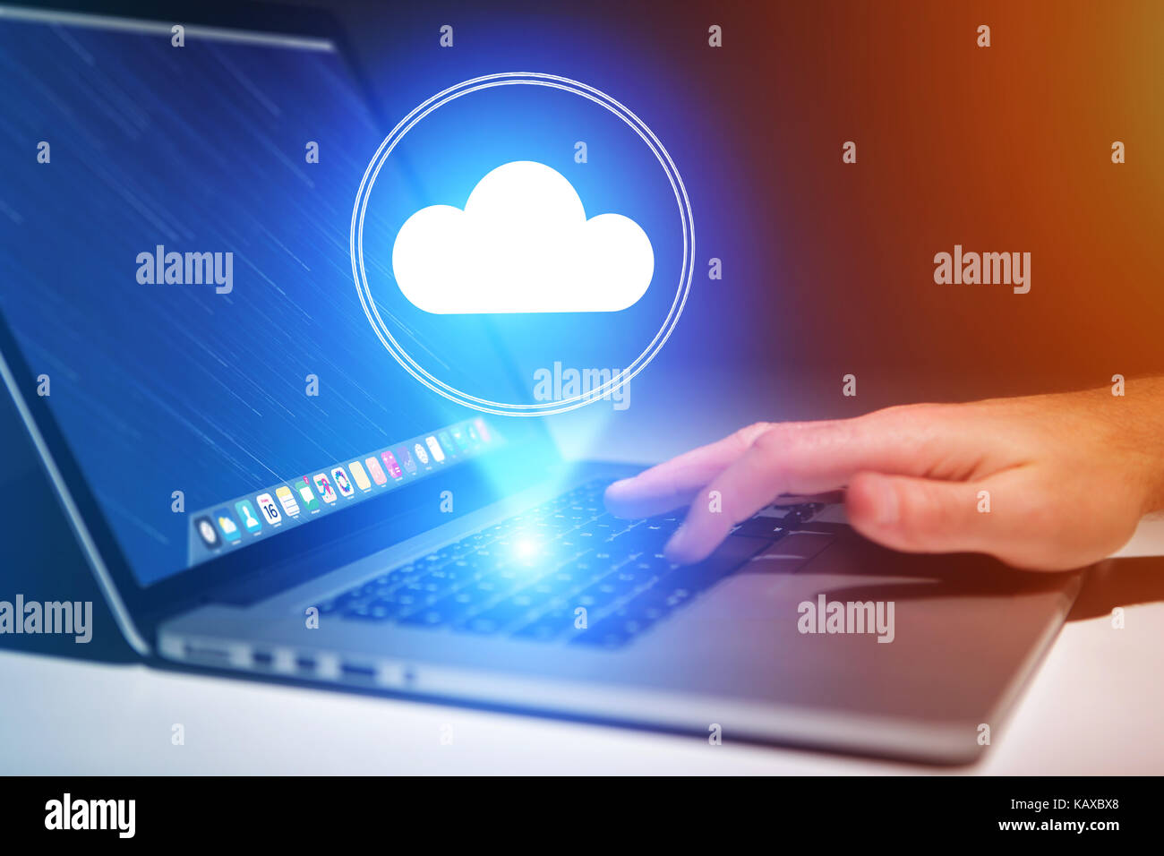 Concept view of cloud storage icon flying out a computer - technology ...