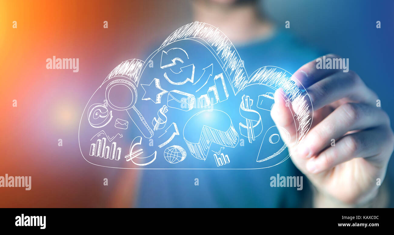View of a Man drawing business icons on a cloud on a technology futuristic interface Stock Photo