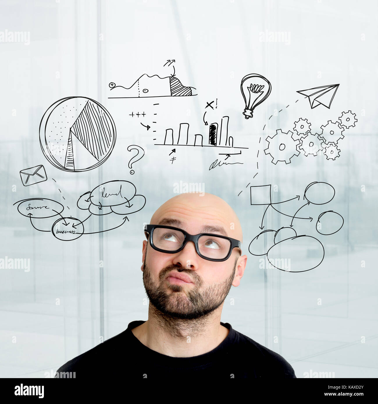 Portrait view of an attractive dubious geek with business icons ...