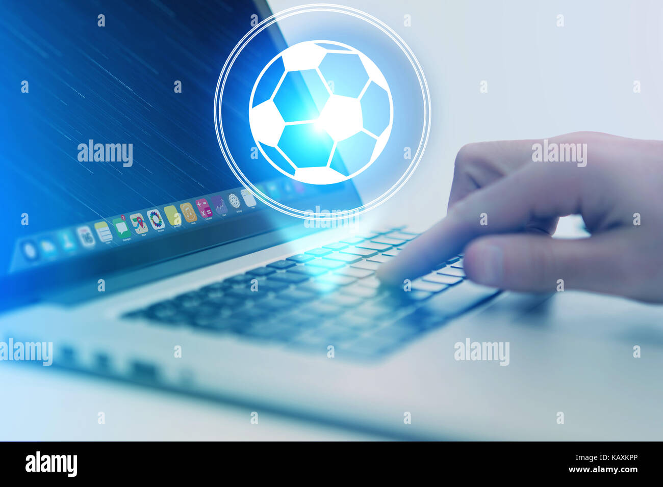 View of a Soccer ball icon over device - Sport and technology concept Stock Photo