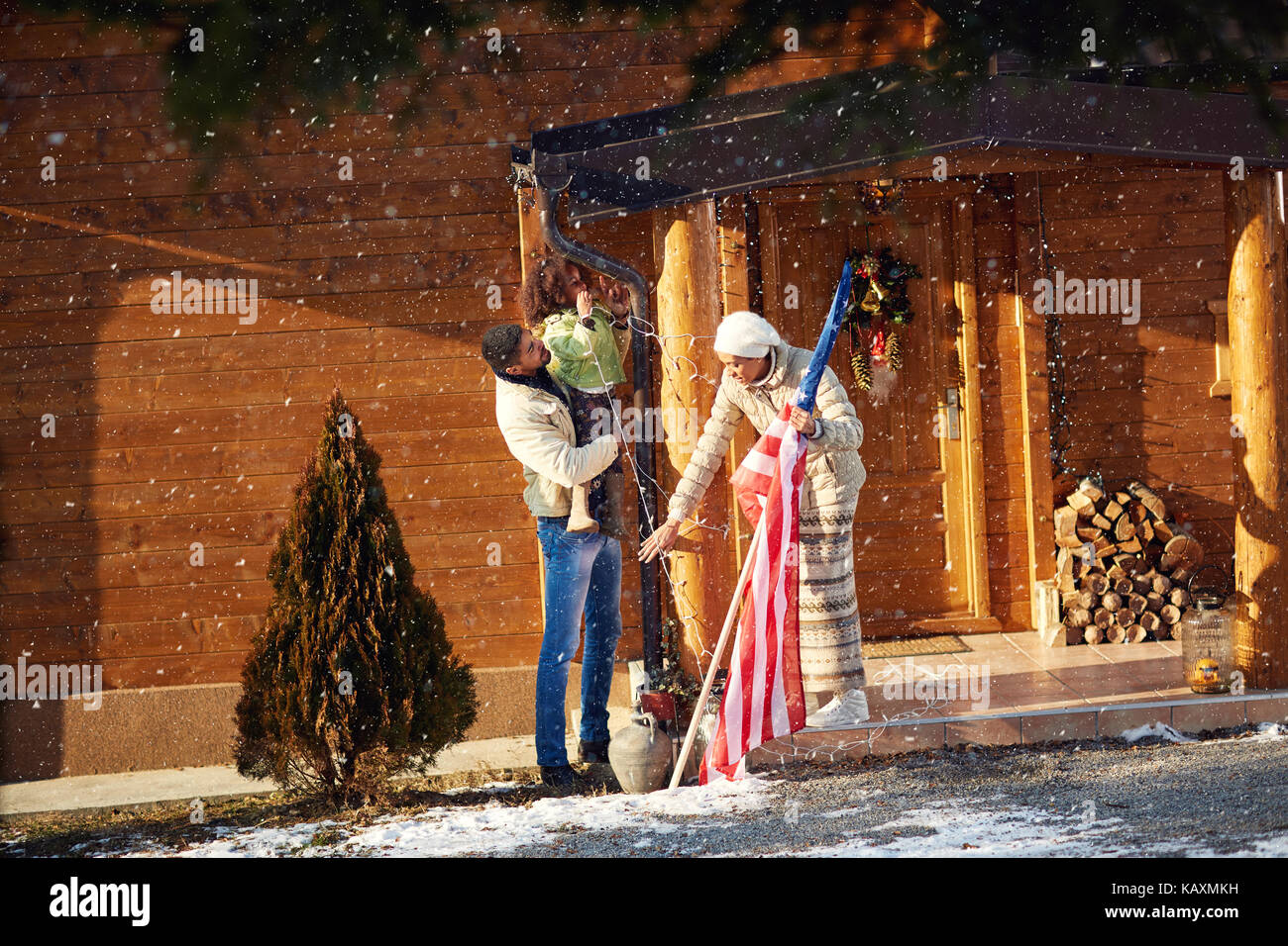 Black family smiling outside house hi-res stock photography and images ...