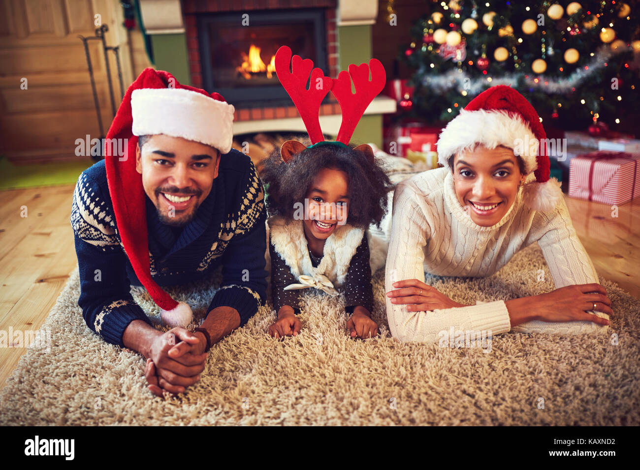 Afro American family enjoying together on Christmas eve Stock Photo