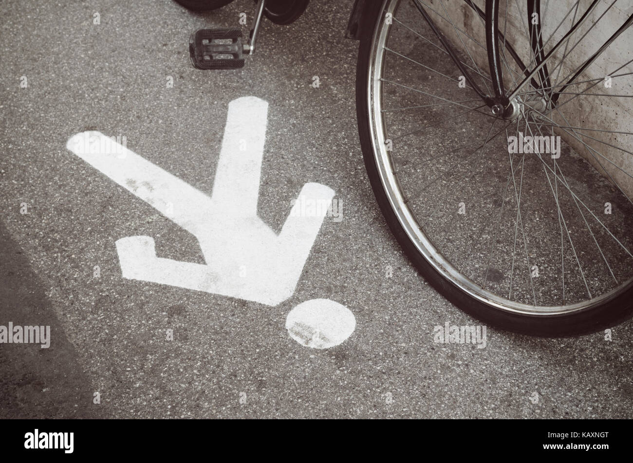 parked bicycle and pedestrian lane symbol Stock Photo