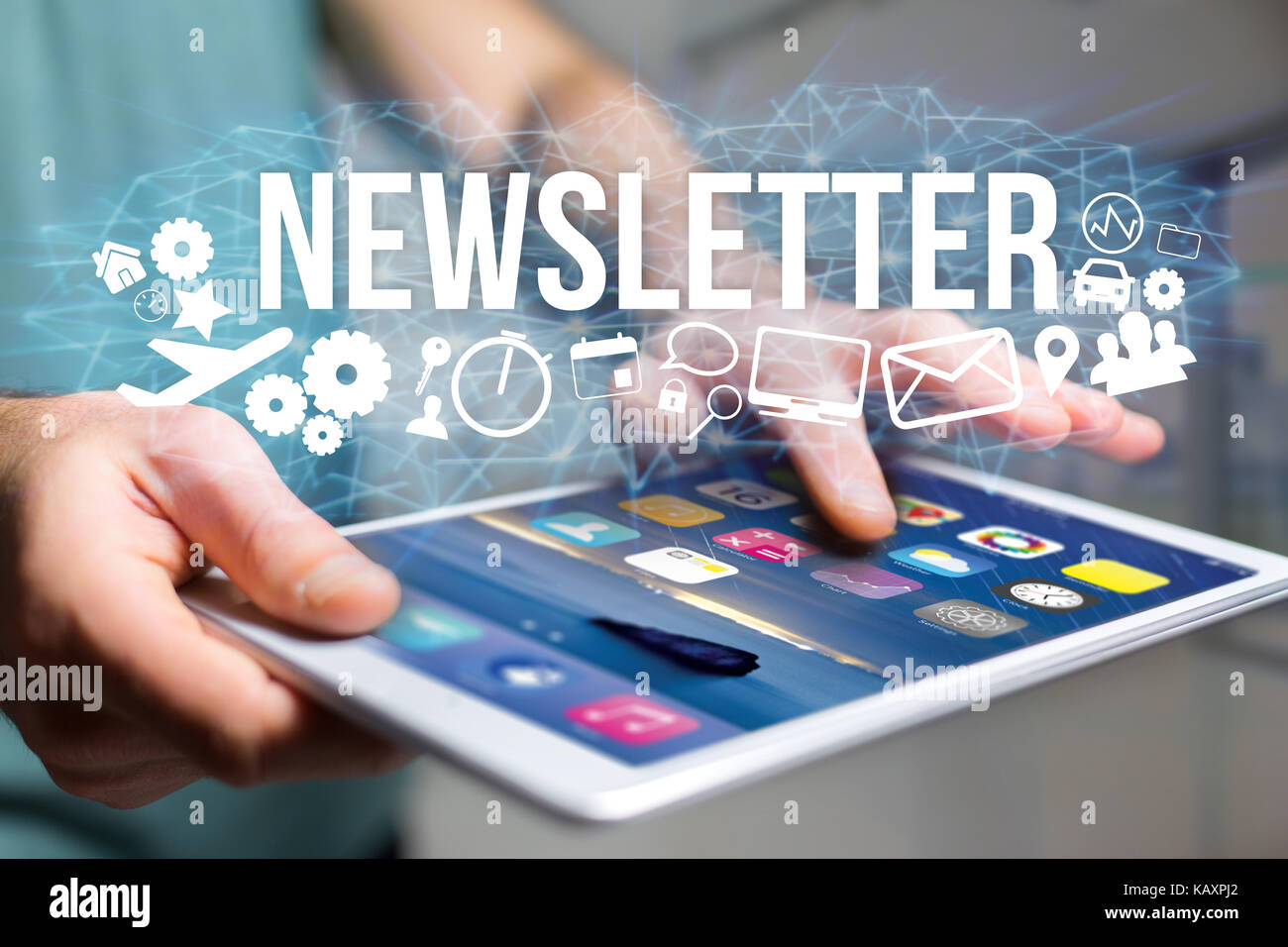 Concept view of man holding futuristic interface with newsletter title ...