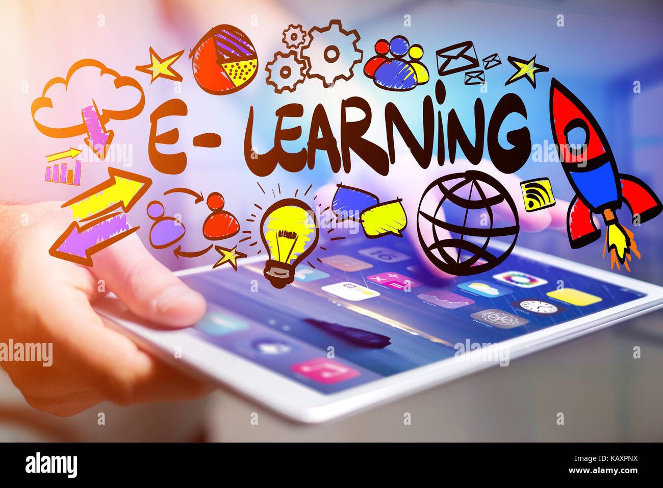 Concept view of man holding interactive interface with e-learning title ...