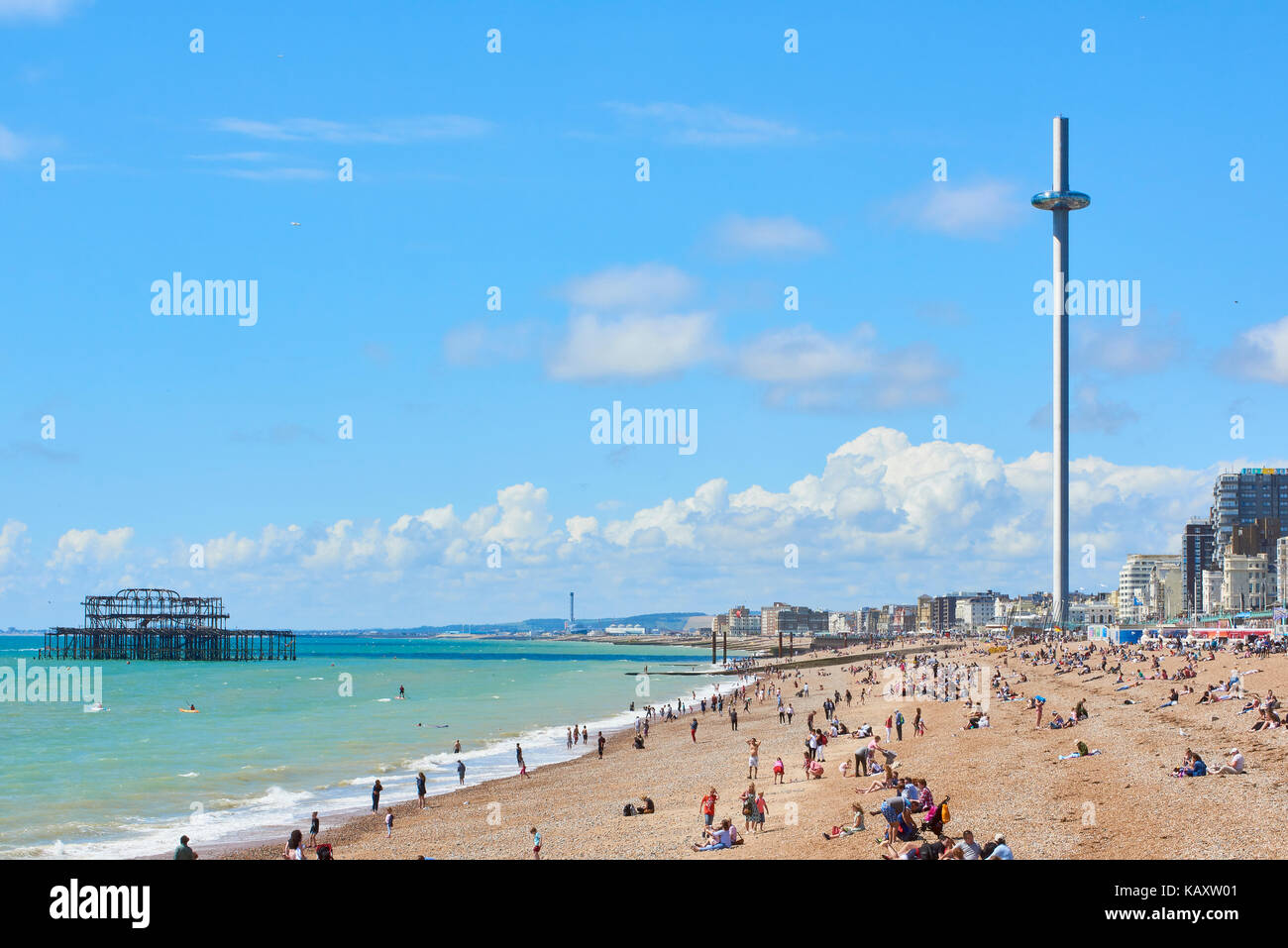 Side-view of Brighton seafront featuring British Airways 1360 viewing tower and remains of West pier. Stock Photo