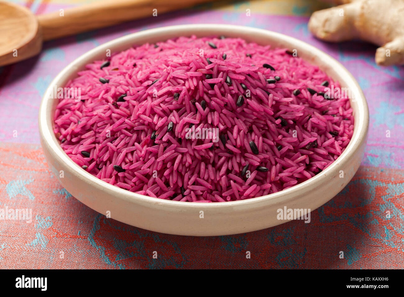Bowl with red organic uncooked indian rice Stock Photo