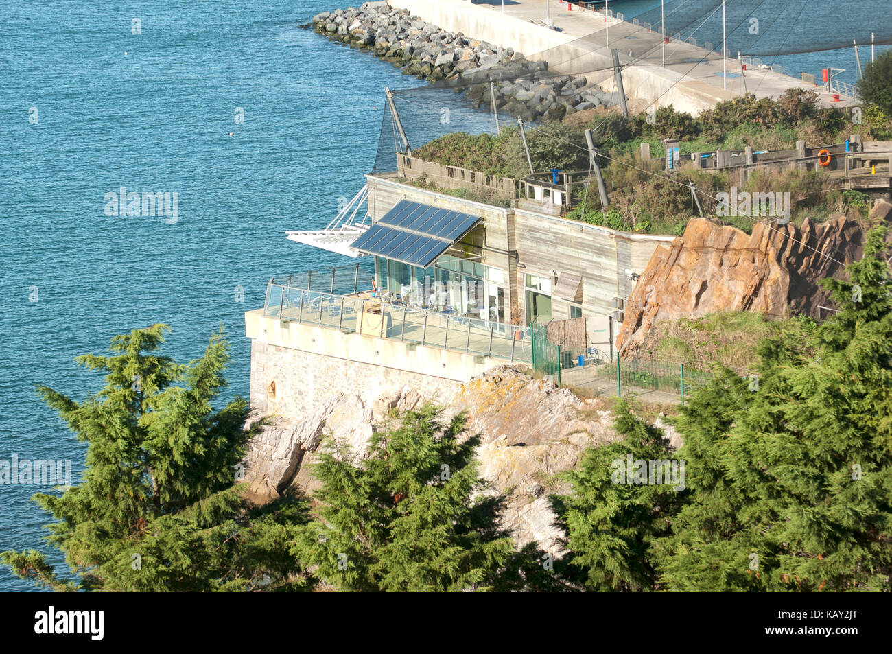 Looking down on the seaside attraction Living Coasts from above Beacon Cove in Torquay. Stock Photo