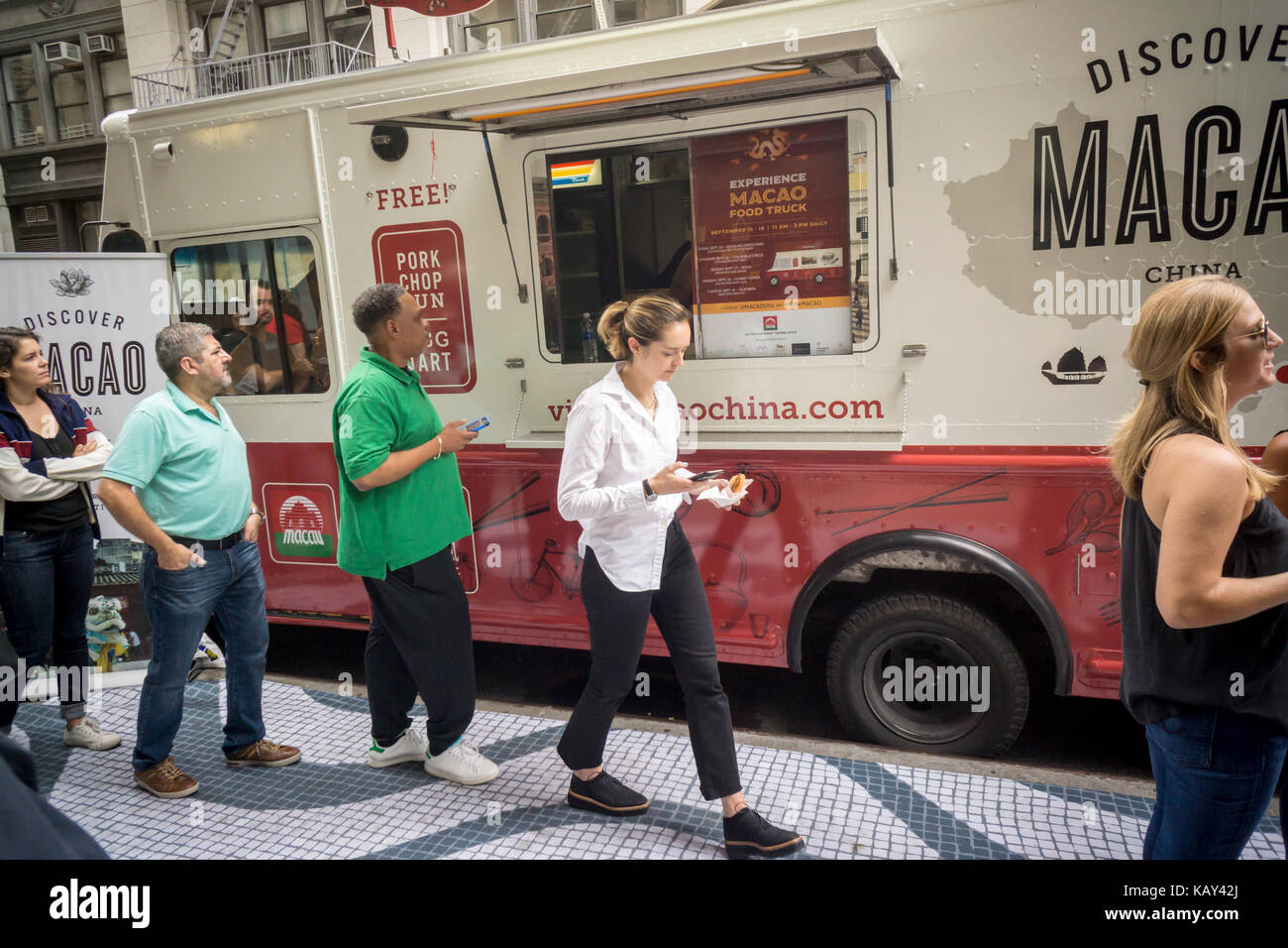 A food truck distributes samples of cuisine from Macao in New York on Tuesday, September 19, 2017 during a branding event for Macao Tourism. Macao is an autonomous region of China and was a Portuguese colony until it was returned to China on December 20, 1999. The Macao tourism office was promoting visits to the city touting the cuisine and the Portuguese influences. (© Richard B. Levine) Stock Photo