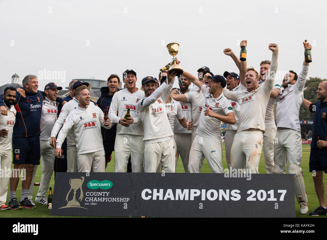 Essex's Ryan ten Doeschate (centre) celebrates with the Division 1 Championship trophy after day three of the Specsavers County Championship, Division One match at the Cloudfm County Ground, Chelmsford. Stock Photo