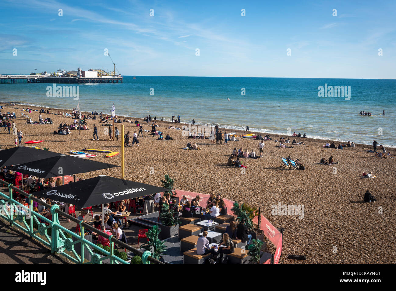 Brighton beach and Brighton Palace Pier in distance, Brighton, England, UK Stock Photo