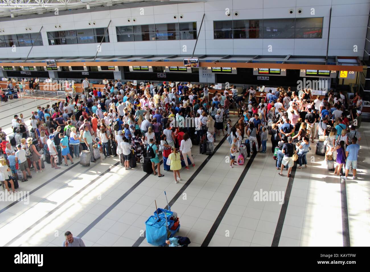 Women check in hi-res stock photography and images - Alamy