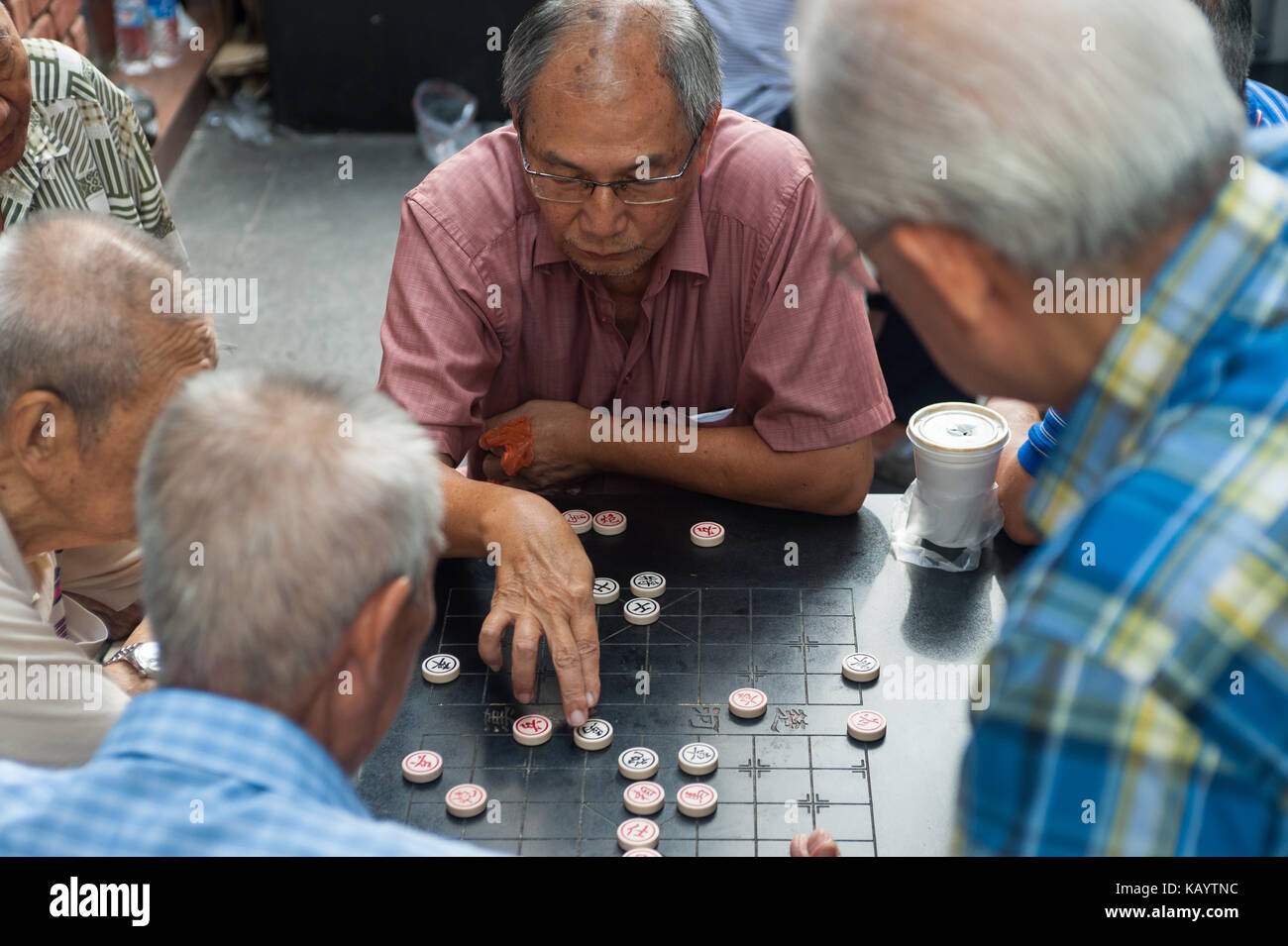 23 07 2017 Singapore Republic Of Singapore Asia Elderly Men Play Chinese Chess Also Known As Xiangqi At A Small Public Square In Chinatown Stock Photo Alamy