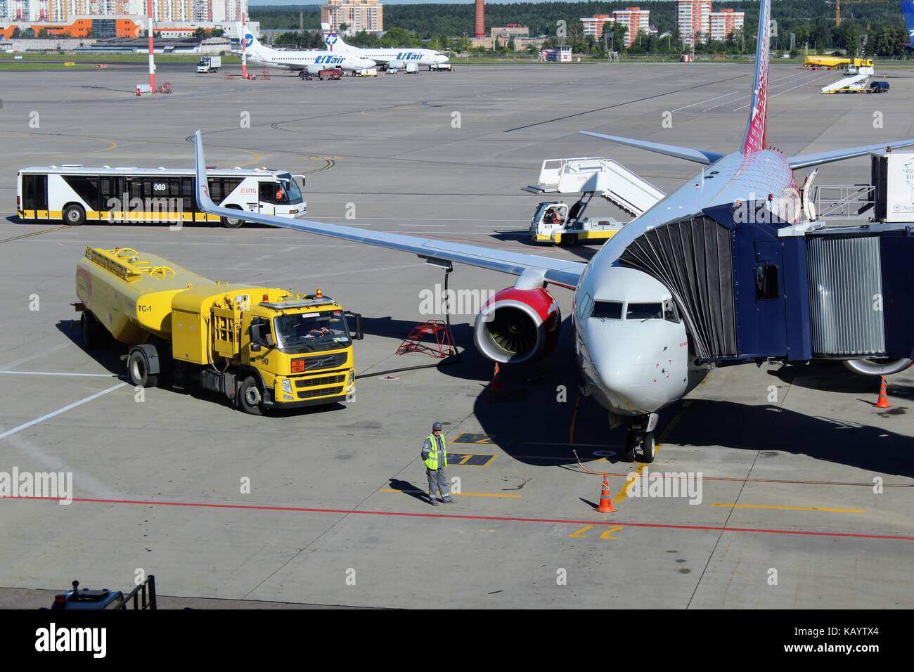 Maintenance of the aircraft at the international airport Vnukovo (Moscow) - July 2017. Stock Photo